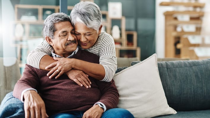 Couple enjoying each other's company in a cozy living area