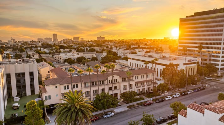 Aerial view of a neighborhood during sunset