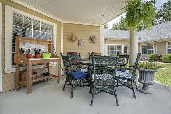 Outdoor seating area with garden view