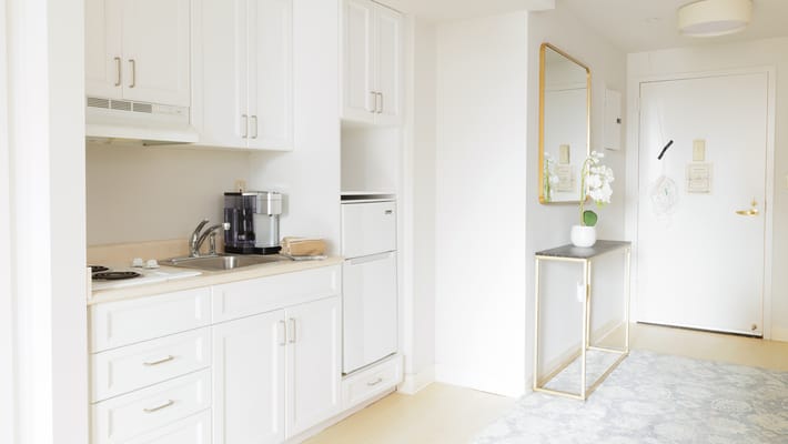 Bright kitchen area in a private resident unit