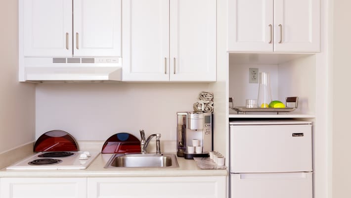 Well-equipped kitchenette in a senior living unit