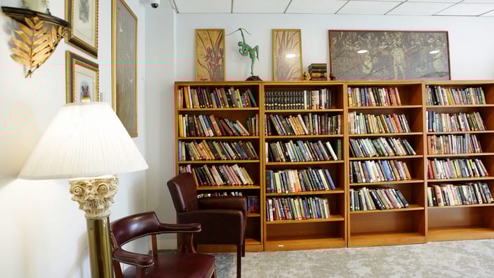 Interior view of a cozy library with bookshelves
