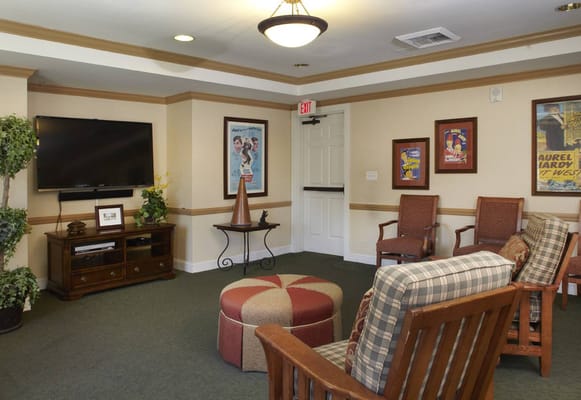 A cozy common area with comfortable seating and decor