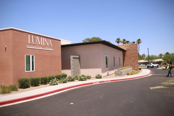 Exterior view of Lumina facility with signage