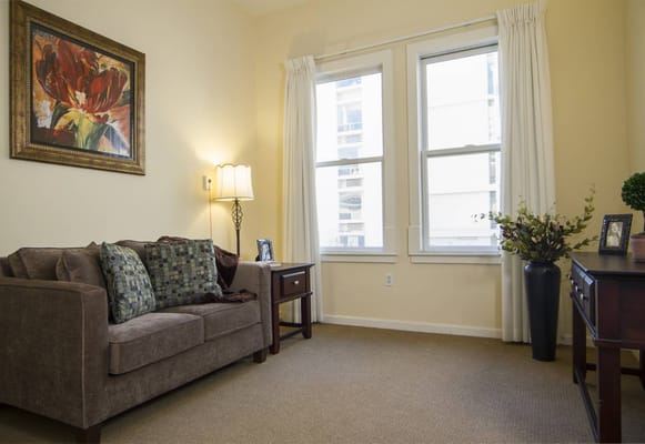 Cozy interior room with a couch and artwork