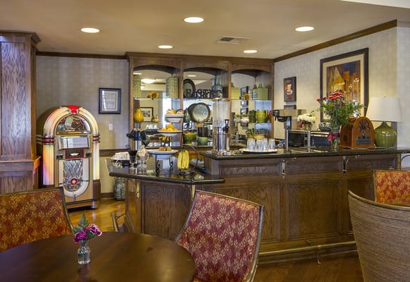 Cozy common area with a retro jukebox and seating