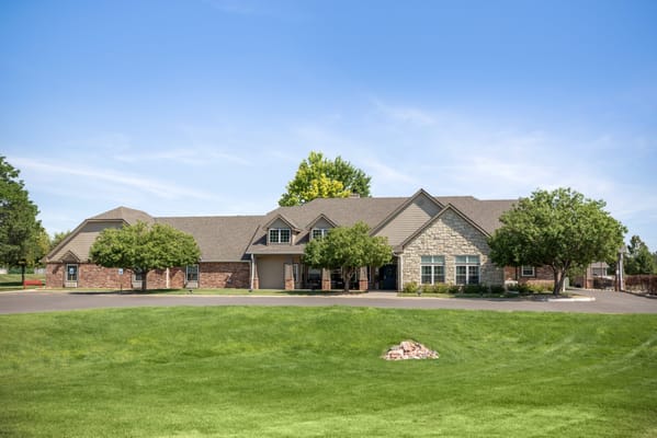 Exterior view of Brookdale Greeley facility on a sunny day