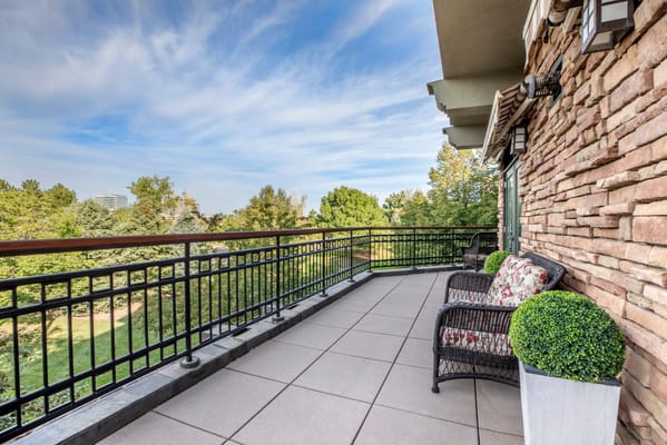 Outdoor seating area overlooking green space