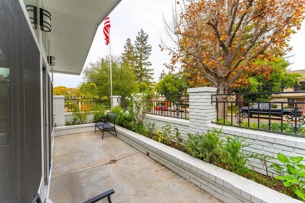 Outdoor patio with seating and garden