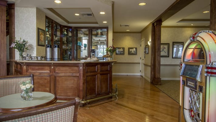 Common area with seating and a jukebox