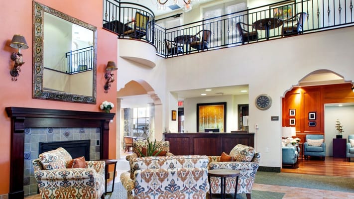 Interior view of a cozy common area with seating