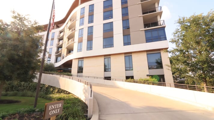 Exterior view of Clearwater at The Heights with landscaped entrance
