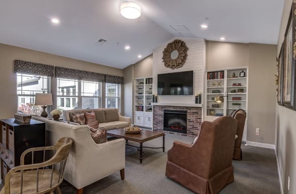 Cozy common area with comfortable seating and fireplace