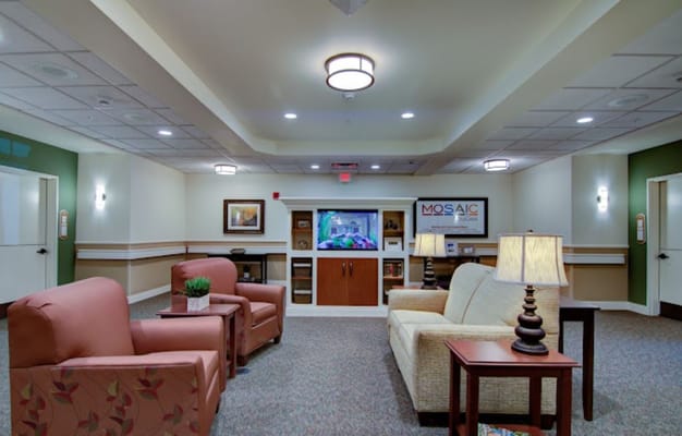 Common area with seating and a television
