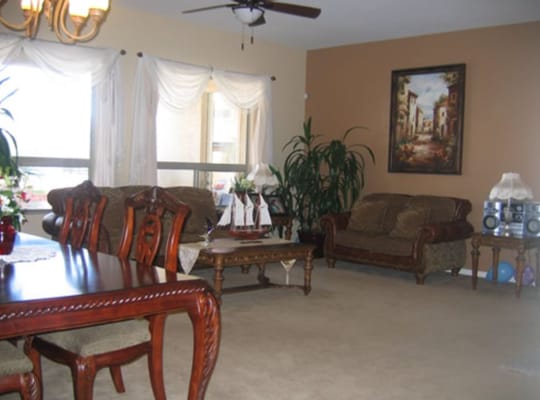 A common area in a senior living facility with furniture