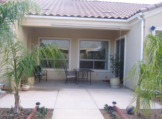 Patio area with seating and plants