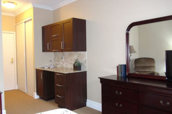 Interior view of a resident room with furniture