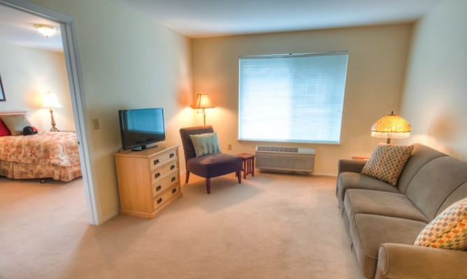 Cozy interior living space with a sofa and television