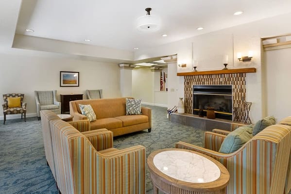 Interior common area with seating and fireplace