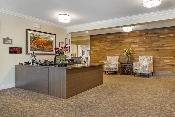 Welcoming reception area with wooden accents