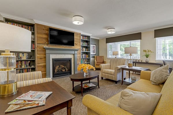 Cozy common area with seating and a fireplace