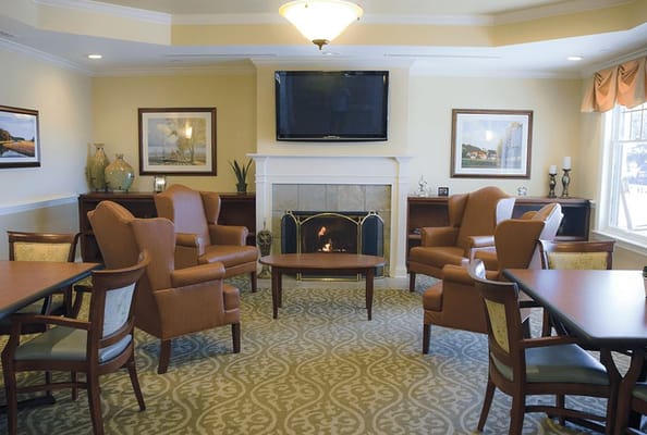 Cozy common area with seating and fireplace