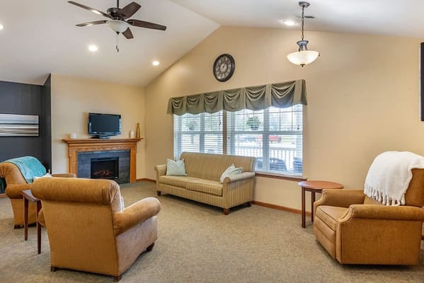 Cozy common area with seating and fireplace