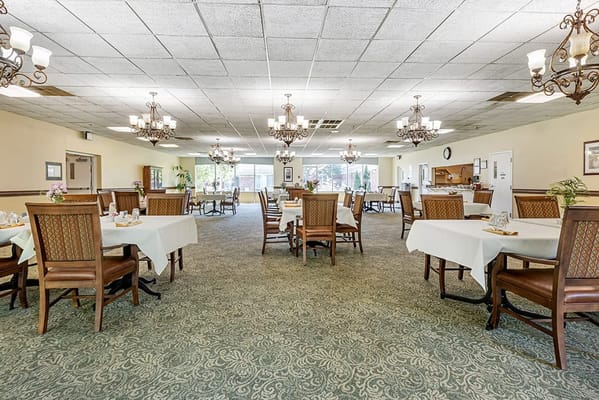 Dining area with tables set for meals