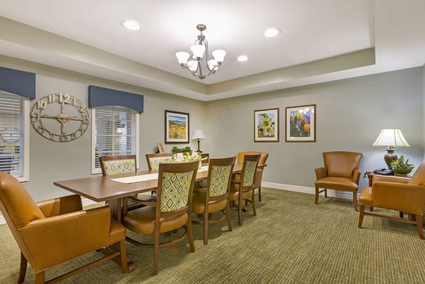 Interior common area with dining table and chairs