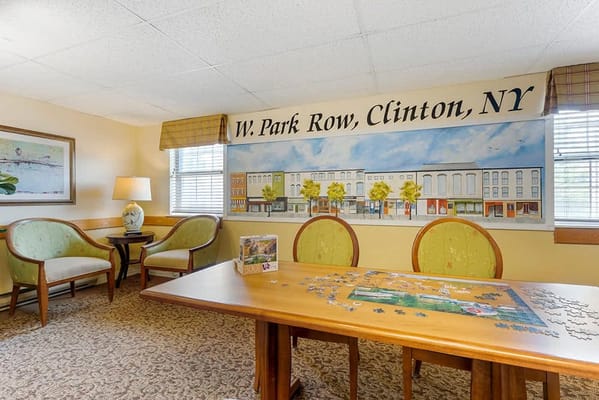 Interior view of a common area with a mural