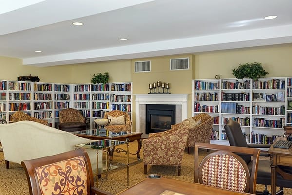 Interior common area with bookshelves and seating