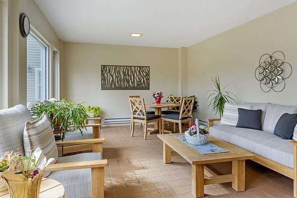 Bright common area with seating and plants