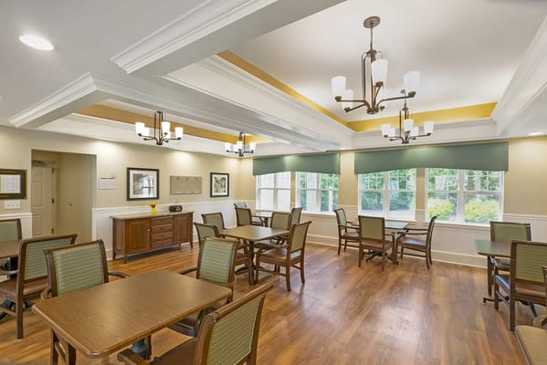 Bright common area with tables and chairs