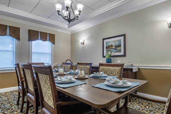 Elegant dining room with a set table and decor