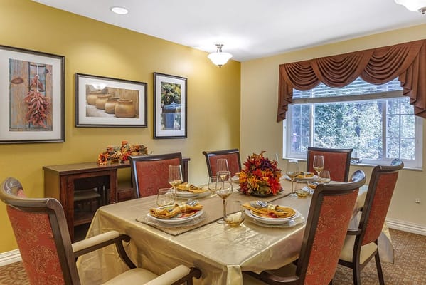 Dining room with a beautifully set table and decor