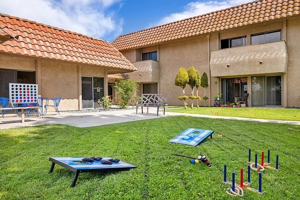 Outdoor space with lawn games and common area