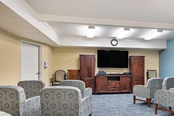 Interior common area with seating and television