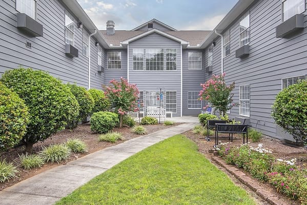 A well-maintained courtyard with garden and pathways