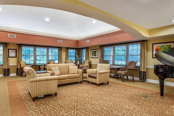 Interior common area with seating and piano