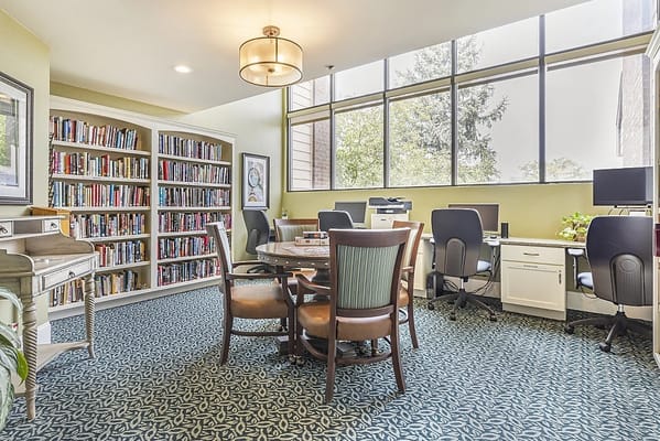 Interior view of a cozy library with seating
