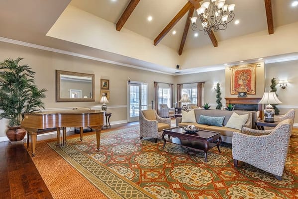 Common area with seating and a grand piano