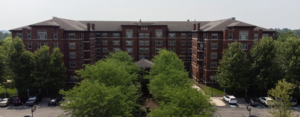 Exterior view of Brookdale Mt. Lebanon building surrounded by greenery