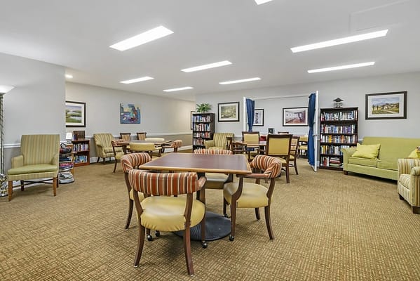 Common area with seating and bookshelves