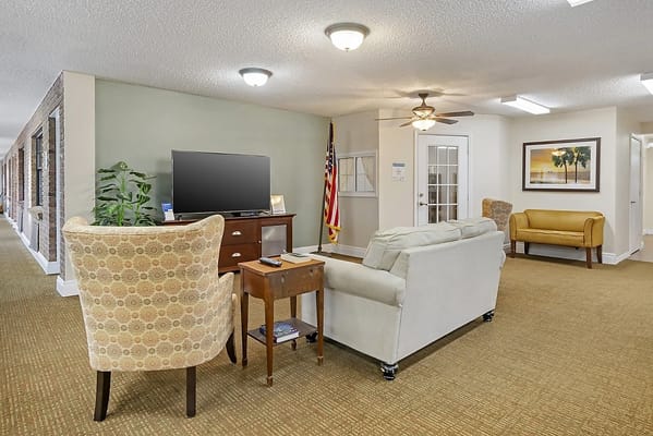 Cozy common area with seating and television