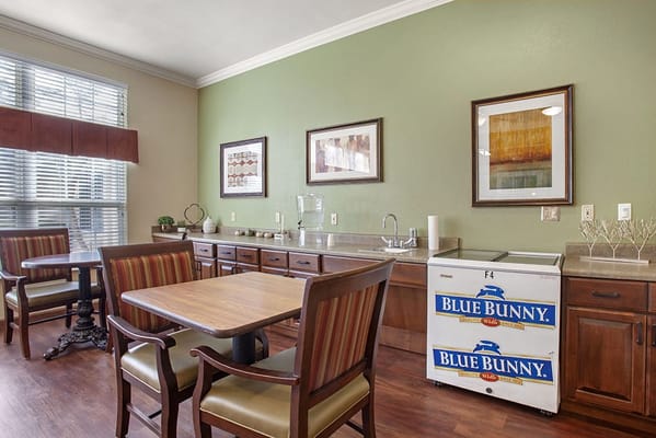 Common area with dining tables and decor