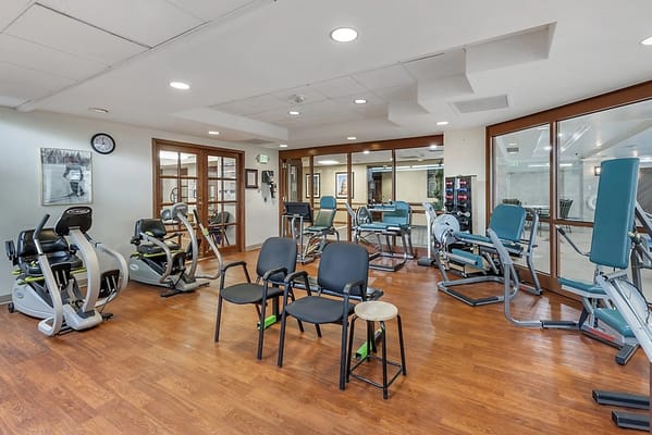 Interior view of a fitness area with exercise equipment