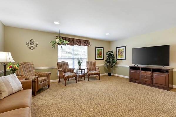 Bright common area with seating and decor