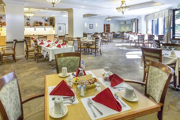 Dining room setup with tables and meals