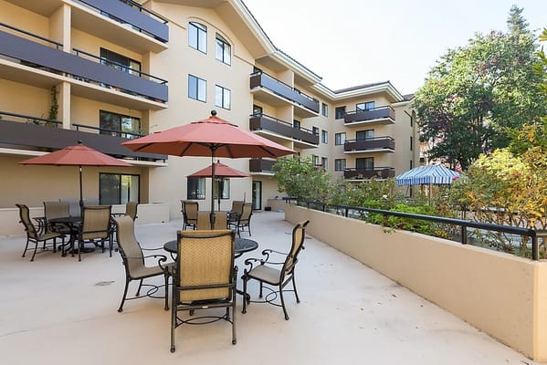 Outdoor seating area with umbrellas and tables