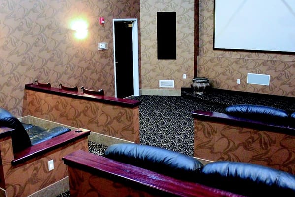 Interior view of a movie theater room with seating